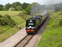 Bulleid West Country Pacific no 34007 <I>Wadebridge</I> passing Winchcombe in June 2007 with a Gloucestershire Warwickshire Railway special from Toddington sporting the <I>Atlantic Coast Express</I> headboard.<br><br>[Peter Todd 03/06/2007]