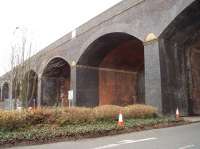 Maudland viaduct shows clear evidence that it was built, in red brick, to carry two tracks but the Blackpool line was later quadrupled by adding a blue brick extension on either side. The bridge still carries Blackpool trains [See image 23385] over Water Lane in Preston but in the 1960s the tracks were reduced back to two. <br><br>[Mark Bartlett 21/03/2010]