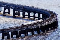 A southbound service heads round the curve at the north end of the Tay Bridge.<br><br>[Ewan Crawford 27/03/2010]