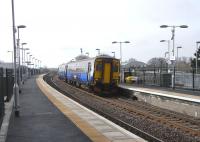 156 502 at Stewarton on 17 March with a service for Glasgow. <br>
Stewarton, like Dunlop, is back to being a two-platform station after a gap of four decades. As the exisiting platform was substantially rebuilt too the whole thing has a new station look. Kimarnock and Stewarton now enjoy a half-hour service to Glasgow, with some of them non-stop and some others calling only at Dunlop. Clattering through Barrhead at speed is a novel experience.<br>
<br><br>[David Panton 17/03/2010]