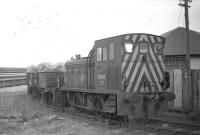 Barclay 0-4-0 no D2413 moving wagonloads of esparto grass away from the dockside at Granton in February 1970.<br>
<br><br>[Bill Jamieson /02/1970]