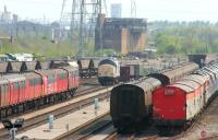 View south east over part of the down side of Tyne Yard on 9 May 2006, with the control tower closed and the main occupants comprising lifted rails, redundant stock and stored class 37s. <br><br>[John Furnevel 09/05/2006]