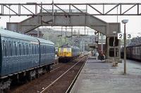 In 1979, trains were still combined or divided at Thorpe le Soken for the London - Clacton/Walton services. A division has just occurred at platform 1 and the front unit is heading off to Walton. Today, platform 1 has no track to serve it.<br><br>[Mark Dufton 07/05/1979]