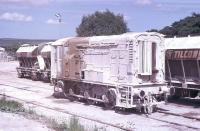 Ex LMS Class 11 shunter 12083 in service with Tilcon at Rylstone and covered with a liberal coating of limestone dust. It had arrived at this railhead on the former Grassington branch in 1973, around the same time as Class 12 No. 15231, [See image 23691] but was more fortunate as it worked until 1998 and then entered preservation. It is currently on the Battlefield line. <br><br>[Mark Bartlett /05/1981]