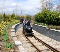 <I>Sid</I> is a 2ft gauge compressed air locomotive, seen here in action on the Statfold Barn Railway on Saturday 27 March 2010. (To reverse, stop - then push in the opposite direction!) <br>
<br><br>[Peter Todd 27/03/2010]