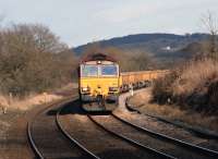 66144 heads west towards Hoghton on 14 March 2010 with an engineers train returning from the track relaying on the WCML at Bolton-le-Sands. The train had traversed the Little North Western route from Carnforth to Settle Junction before heading back to the WCML via Hellifield, Clitheroe and Blackburn.<br><br>[John McIntyre 14/03/2010]