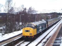 40145 passes South through Carrbridge on 5th April with a Pathfinder railtour. This is the first tour to pass through Carrbridge since the derailment in January. Note the recent repairs to the platform edge.<br><br>[Gus Carnegie 05/04/2010]