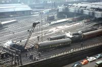 A steam crane, EE Type 4 and 2-6-4 tank are all in attendance at this Waverley DMU derailment on 16th February 1965. Part of the old elevated walkway linking Jeffrey Street and Calton Road can be seen in the background.<br>
<br><br>[Frank Spaven Collection (Courtesy David Spaven) 16/02/1968]