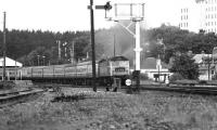 An accelerating class 47 takes Inverness-bound 1S59 north out of Aviemore in June 1974. <br>
<br><br>[John McIntyre 15/06/1974]