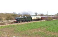 Ex-GWR Castle class 4-6-0 no 5029 <I>Nunney Castle</I>, westbound with a special on 6 April, passing the site of Shrivenham Station on the outskirts of Swindon. <br>
<br><br>[Peter Todd 06/04/2010]