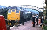 Plenty of traffic for this Class 24-hauled Kyle of Lochalsh - Inverness train calling at Strathcarron in 1974.<br><br>[Frank Spaven Collection (Courtesy David Spaven) //1974]