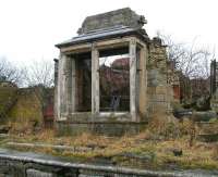 Last stand at Bowes. The remains of the bay window of the booking office at the former Bowes station. Photograph taken on 20 March 2010 looking north across the trackbed.<br><br>[John Furnevel 20/03/2010]