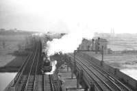 A train on the WCML about to cross the Eden at Etterby heading north from Carlisle in March 1961.<br><br>[K A Gray 30/03/1961]