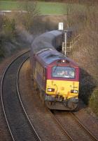 67021 nears Aberdour with the empty stock of the 17.21 Edinburgh - Cardenden service on 8 April.  [See image 28405] <br><br>[Bill Roberton 08/04/2010]