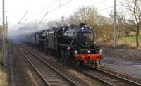 Black 5 no 44871 pilots Britannia 70013 <i>Oliver Cromwell</i> towards the end of day 3 of <I>The Great Britain III</I> tour of 2010 as it approaches Balshaw Lane Junction on 8 April, running some 110 minutes later than expected.<br><br>[John McIntyre 08/04/2010]