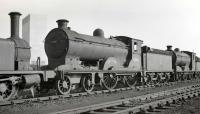 Reid ex-NBR D30 'Scott' class 4-4-0 no 62442 <I>Simon Glover</I> awaits its fate in the sidings at Thornton Junction in 1959. Withdrawn from 62A in July 1958, the locomotive was eventually cut up at Motherwell Machinery & Scrap, Wishaw, in February 1960.<br><br>[K A Gray //1959]