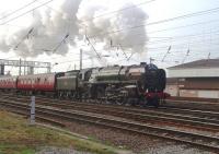 Britannia Pacific no 70013 <I>Oliver Cromwell</I> lifts <I>The Great Britain III</I> (Day 4) out of Preston passing the power box at the start of the leg to Glasgow via Shap and Beattock. The Britannia was standing in for <I>Scots Guardsman</I> which remains 'indisposed'. <br><br>[Mark Bartlett 09/04/2010]