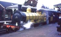 The preserved ex-Highland Railway Jones Goods 4-6-0 no 103 stands at the up platform at Dumfries with a BLS railtour from Glasgow on 17 October 1965. [See image 21342]<br><br>[Frank Spaven Collection (Courtesy David Spaven) 17/10/1965]