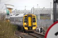 158 736 on the 17.18 from Edinburgh arrives at the current Bathgate station on 10 April 2010. Work on its replacement continues in the background with the new light maintenance depot standing alongside.<br>
<br><br>[Bill Roberton 10/04/2010]