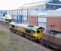 Freightliner 66560 passes Ashton Gate, Bristol, on 9 February with coal from Portbury import terminal on the Portishead branch destined for Rugeley power station.<br><br>[Peter Todd 09/02/2010]