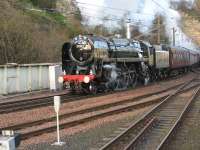 70013 makes an impressive sight (and sound!) storming up the gradefrom the Calton Tunnel intoWaverley at the end of its journey from Inverness,having been routed round the Sub to enter the station from the east. <br>
<br><br>[Mark Poustie 13/04/2010]