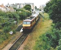 EWS 90 026 about to leave North Berwick terminus for Edinburgh in July 2004. Photographed during the short period when loco-hauled services operated pending a change of EMU stock.<br><br>[David Panton /07/2004]