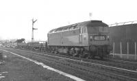 Brush Type 4, D1997, passing St Margarets on Saturday 28 February 1970 with the 4E35 13.58 from BathgateUpper to Ripple Lane (Dagenham) composed mostly of Cartic 4s with a couple of Carflats at the head of the train. On weekdays this train would have been routed via the Sub to Niddrie West then via Wanton Walls to Monktonhall Junction, but on Saturdays was booked to run via Waverley (with a stop from 14.32 to 14.38 for a crew change) as the few signalboxes stillextant on the Sub would normally be closed then.<br>
<br><br>[Bill Jamieson 28/02/1970]