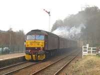 With 70013+61994 up front, 47760 is the supporting class 47 at the rear of the GBIII as it accelerates away from Dunkeld towards Perth on 13 April 2010.<br><br>[Brian Forbes 13/04/2010]