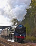 The second SRPS 'Forth Circle' railtour charges away from Dalgety Bay on 18 April 2010 behind 70013.<br><br>[Bill Roberton 18/04/2010]