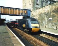 A GNER liveried 125 arrives at Haymarket in July 1999.<br><br>[David Panton /07/1999]