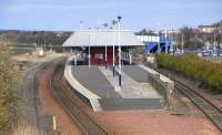 View over the south end of Leuchars station on 14 April 2010.The site of the bay used by some East Fife line services can clearly be made out. St Andrews still appears on the departure monitors here, but the platform number is 'BUS'.Note the shortening of the Up platform: this is mirrored at the northern end [see image 28538] making Platform 1 significantly shorter than Platform 2.This is quite an achievement for an island station and I can't quite work out the rationale behind it! <br>
<br><br>[David Panton 14/04/2010]