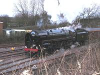 In the gathering dusk <I>Oliver Cromwell</I> brings the empty stock of the afternoon <I>Forth Circle</I> railtour from Inverkeithing station into Inverkeithing Yard to await a class 37 which will tow the train back to Bo'ness. <br>
<br><br>[Mark Poustie 18/04/2010]