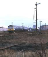 A DMU for Cleethorpes heads south east away from New Holland Town in December 1974.<br><br>[Bill Jamieson 14/12/1974]