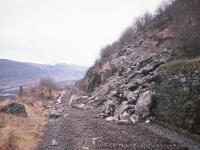 Scene of the landslip that prematurely closed the Callander-Crianlarich section of the Callander & Oban line on 27th September 1965, photographed a few days after the rails had been removed in December 1966. <br>
<br><br>[Frank Spaven Collection (Courtesy David Spaven) /12/1966]