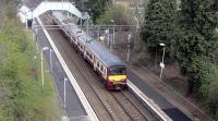 Looking west over Kilpatrick station from the Erskine Bridge on 24 April 2010 as 320 308 prepares to leave with a Balloch to Airdrie service.<br><br>[David Panton 24/04/2010]