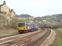 Having called at Dewsbury on its way to Leeds, Northern Pacer 144004 rejoins the main line from the platform loop that allows overtaking for trains travelling north. View towards Batley from the southbound platform.<br><br>[Mark Bartlett 24/04/2010]