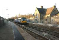 Northern unit 142003 comes to a halt at Appley Bridge station on 10 February 2010 with an afternoon Southport to Huddersfield service.<br>
<br><br>[John McIntyre 10/02/2010]