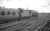 <I>Patriot</I> class 4-6-0 no 45526 <I>Morecambe and Heysham</I> takes the 2pm Glasgow Central - Manchester / Liverpool train out of Carlisle in the summer of 1964. The locomotive was eventually withdrawn from Carlisle Upperby shed towards the end of that year.<br><br>[K A Gray 25/07/1964]