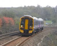 Monsieur Reynard [see image 28671] having deigned to make way for it, 158 734 approaches Summerston with an Anniesland service on 24 April.Due to engineering works at Cowlairs lasting several weeks this train has originated from Ashfield rather than Glasgow Queen Street. The seven stations on this line come thick and fast, averaging a little over half a mile apart. <br>
<br><br>[David Panton 24/04/2010]