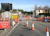 Approaching Uphall station from the south, with major work on the rail bridge to the west of the station progressing on Sunday 2 May. The single-file B8046 road north below the bridge is currently being widened with access to the station and car parks accessible only from this side via the road turning off to the right. <br><br>[John Furnevel 02/05/2010]