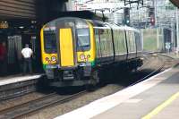 Looking west through Birmingham International station on 28 April 2010 as London Midland 350105 calls with a service to Birmingham New Street.<br><br>[John McIntyre 28/04/2010]