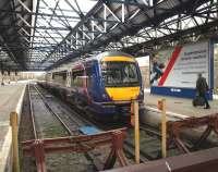 A driver heads for his train in the north bay at Dundee on 1 May 2010.<br><br>[Brian Forbes 01/05/2010]