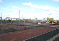 Looking south west from Edinburgh Road across the former yard towards the under construction Bathgate station on 2 May 2010, with work on associated road access, pathways and parking bays well underway.<br><br>[John Furnevel 02/05/2010]