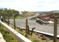 Looking back towards Blackridge on 2 May 2010, from the point west of the village where the A89 crosses the trackbed at Bedlormie Toll. Considerable construction work is underway in this area at present.<br><br>[John Furnevel 02/05/2010]