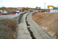 Some notable progress at Armadale on 2 May 2010, on the previously heavily waterlogged section of the trackbed west of Station Road bridge. View is towards Blackridge with the under-construction Armadale station on the other side of the roadbridge behind the camera. [See image 26594].<br><br>[John Furnevel 02/05/2010]