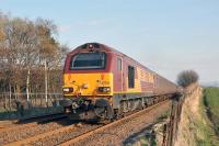 67026 catches the evening sun south of Dunfermline with 2L69, the 17:21 Edinburgh to Cardenden service, on Thursday, 15 April 2010.<br>
<br><br>[Andy Carr 15/04/2010]
