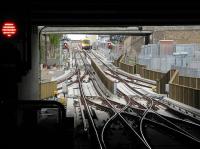 View south from the new Dalston Junction station on 9 May 2010 along what was once the route to Broad Street. This was the first day of full service on what is now the new East London Line extension. The station has four platforms, the inner two terminate at buffer stops, while the outer two veer west to eventually join the North London Line at Western Junction [see image 5172].<br><br>[John Thorn 10/05/2010]