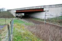 Looking north over the site of Kirtlebridge station and junction (for Annan and the Solway Viaduct) in 2010. Both have been oblitered with the remaining mainline now crossed by the M74. The station and junction line formerly occupied the left hand side of this view.<br><br>[Ewan Crawford 15/04/2010]