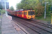 A Tyne & Wear Metro train calls at a leafy South Gosforth station on 14 May 2010 with an afternoon service to South Hylton.  <br><br>[Bruce McCartney 14/05/2010]