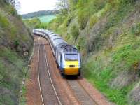 An 'East Coast' 125 nears Aberdour on 10 May with the morning Leeds - Aberdeen service, running between its scheduled stops at Inverkeithing and Kirkcaldy.  The fact that 17 minutes is allowed for these 13 miles is, I'm afraid, down to the Victorians, since the line was not engineered for speed.  It has an unlikely summit at Dalgety, only short straights, plus 20/25mph restrictions through Burntisland station and Kinghorn tunnel.<br>
<br><br>[David Panton 10/05/2010]